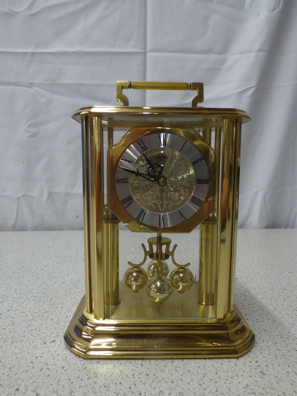 Lot 375: A Haller Gold-Coloured Quartz Anniversary Clock