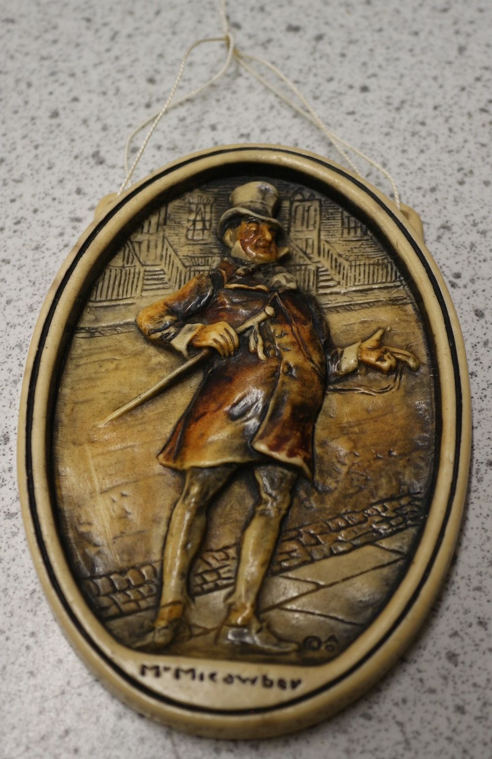 Lot 429: An Arnold Osborne Ivorex Plaque depicting M. Micawber