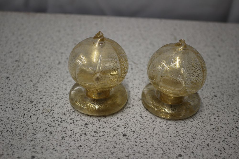 Lot 338: A Pair of Murano Style Gold Flecked Glass Door Knobs