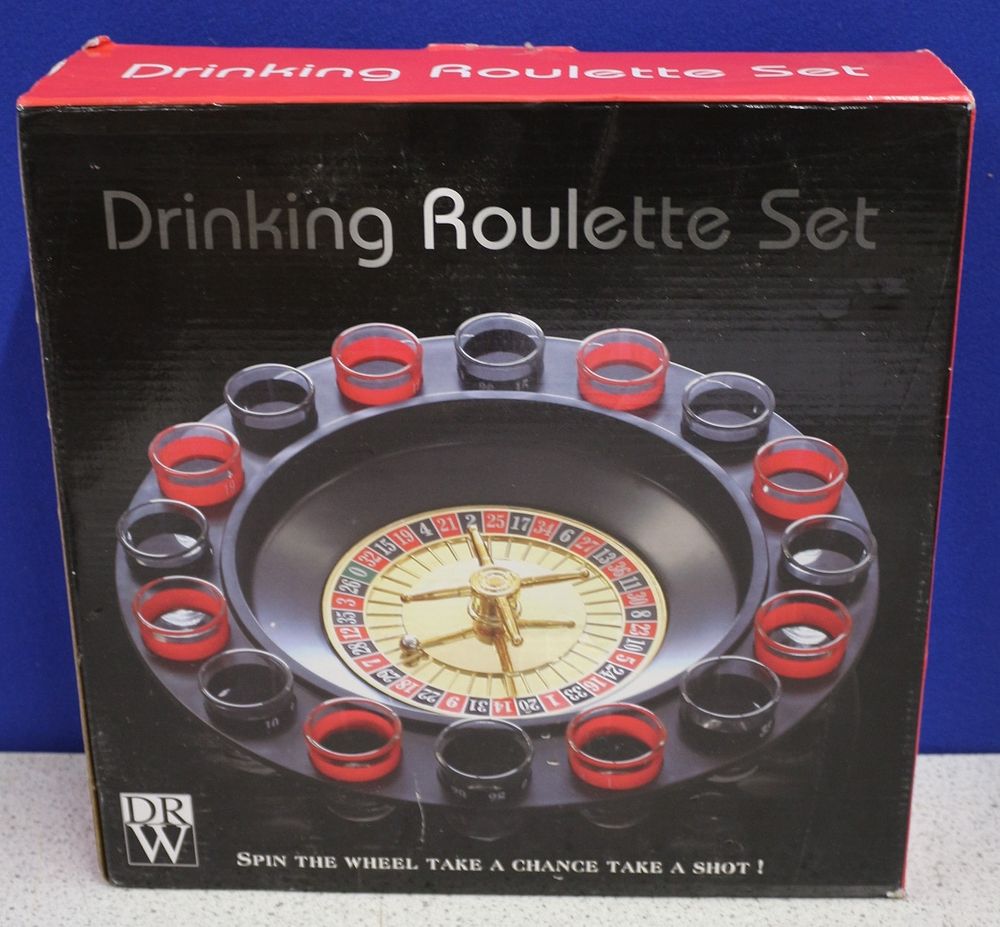 Lot 352: Drinking Roulette Set with Seventeen Shot Glasses