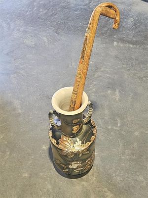Japanese Satsuma Porcelain Vase With Canes. 24" high 9 1/2" wide, has a chip on the top