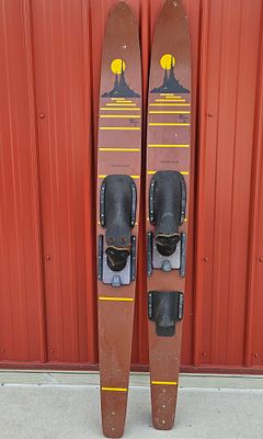 A Pair of Vintage Lake Region Daybreaker Wooden Water Skis. This pair of wooden water skis 