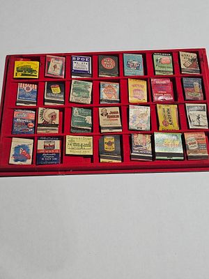 Collection of Twenty-Eight Vintage Advertising Matchbook Covers in Tray. This collection 