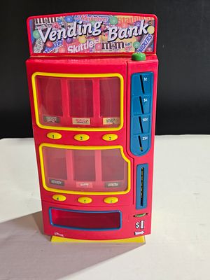Mars Vending Bank Tabletop Candy Dispenser. This molded plastic tabletop candy dispenser is 