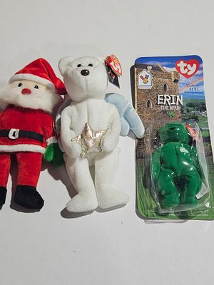 Three Ty Beanie Babies including Halo and Erin the Bear. This trio of Ty Inc. plush toys 