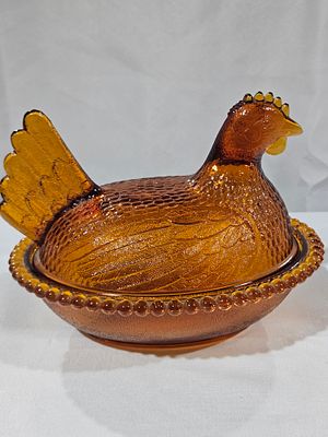 Indiana Glass Amber Hen on Nest Covered Candy Dish. This two-piece pressed glass covered dish by 