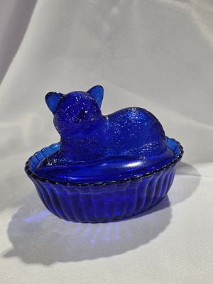 Cobalt Blue Pressed Glass Cat on Nest Covered Dish. This 5" deep cobalt blue glass dish features 