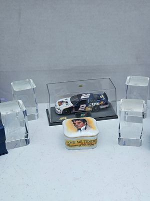 A Collection of Elvis Presley Memorabilia including Revell Die-Cast Car. This lot features a 