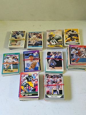 A Large Collection of 1989-1992 MLB and NFL Trading Cards. This extensive collection features 