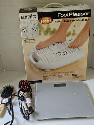 An Assortment of Home Wellness and Personal Care Electronics. This lot features a HoMedics 