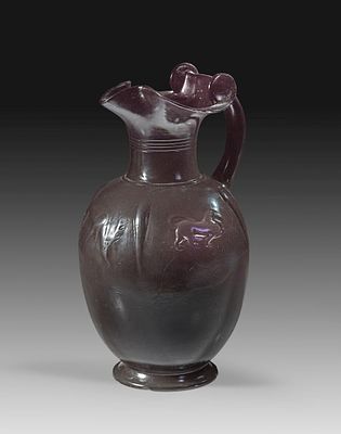 Large Etruscan treefoil jug in Bucchero pesante. 575 -550 BC. Height 32,7cm, &oslash; corpus 18,2cm. 