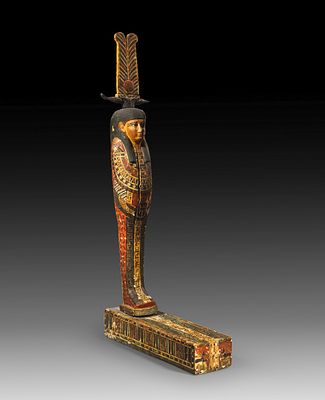 Large statuette of Ptah-Sokar-Osiris. Figure 71.5 cm, base L 38.5 cm, W 11 cm, H 8 cm. Wood 