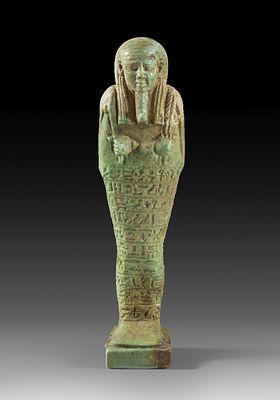 Ushabti made of green faience for the general Ankh-Wahibre-Sa-Neith. Ushabti made of green 