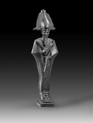 Bronze statuette of Osiris. Bronze statuette of Osiris, mummy-like figure wearing an atef crown 