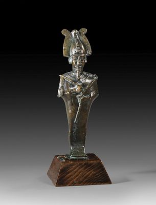 Bronze statuette of Osiris. Bronze statuette of Osiris, mummy-like figure wearing an atef crown 