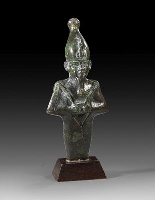 Bronze statuette of Osiris. Bronze statuette of Osiris, mummy-like figure with atef crown 