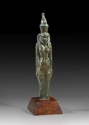 Bronze statuette of the goddess Mut. Bronze statuette of the goddess Mut with double crown and 
