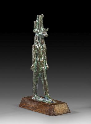Bronze statuette of the snake-headed god Nehebkau. Bronze statuette of the snake-headed god 