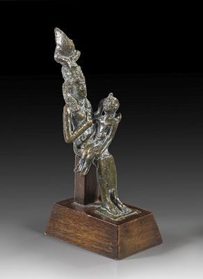 Bronze statuette of Isis. Bronze statuette of Isis breastfeeding the infant Horus, H 10.5cm 