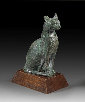 Bronze statuette of Bastet. Bronze statuette of Bastet in form of a sitting cat, H 13cm 
