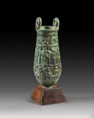 Bronze situla with three rows of reliefs. Bronze situla with three rows of reliefs, at the 