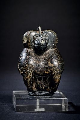 Statuette of a baboon. A very precisely sculpted figure of Thot as a baboon made of black 