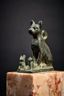 Cat amulet. A bronze amulet depicting a mother cat with two kittens. Late Period, 26th Dynasty 