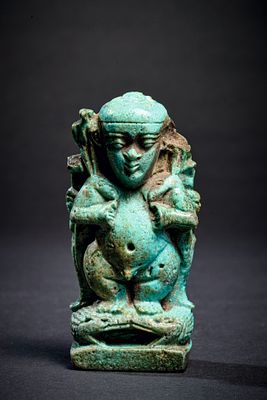 Pataikos. Large amulet of turquoise faience. Late Period, ca. 26th Dynasty, 664 - 525 BC. 
