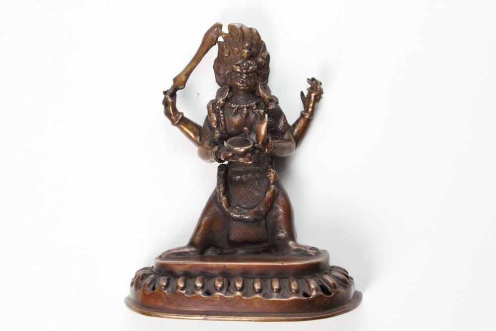 Lot 34: Chinese Tibetan Bronze Buddha Statue with Four Arms...