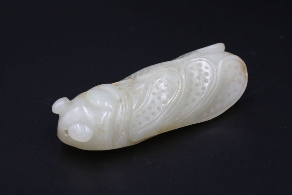 Lot 37: This finely crafted Chinese cricket jade, originating from...