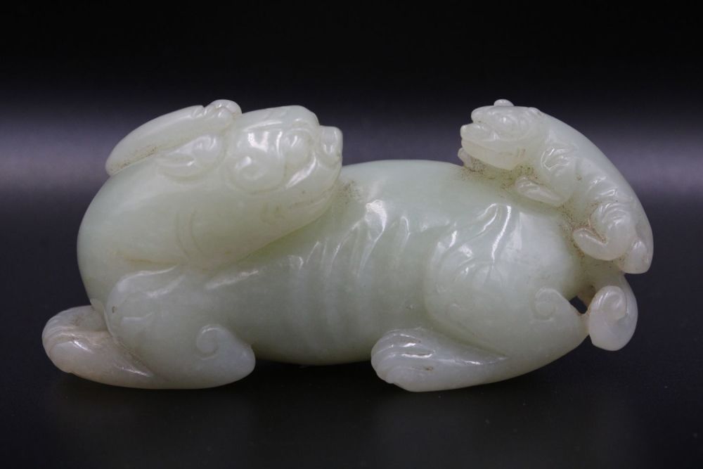 Lot 46: This stunning Chinese jade sculpture portrays a mythical...