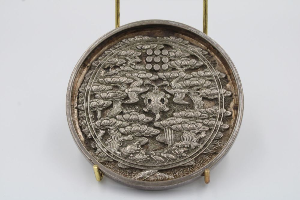 Lot 49: This exquisite Japanese mirror, crafted during the Meiji...
