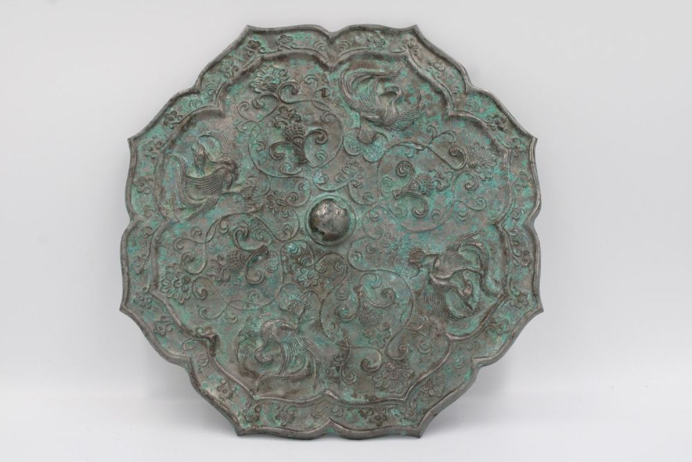 Lot 68: One Tang style bronze mirror with phoenix and...