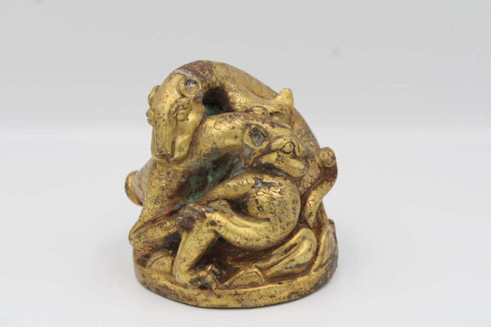 Lot 69: Han style bronze weight Qing dynasty, of two...