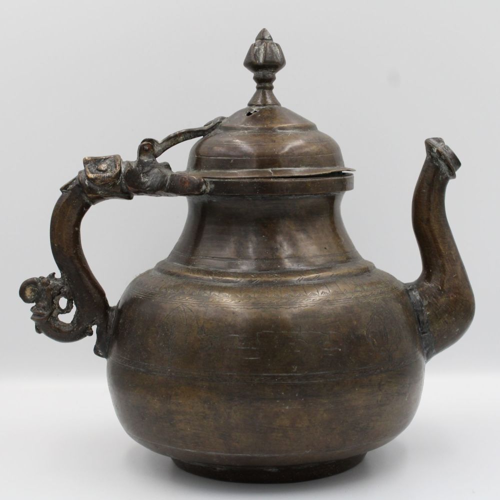 Lot 89: 19th Century Indian Mughal Bronze Teapot with Intricate...
