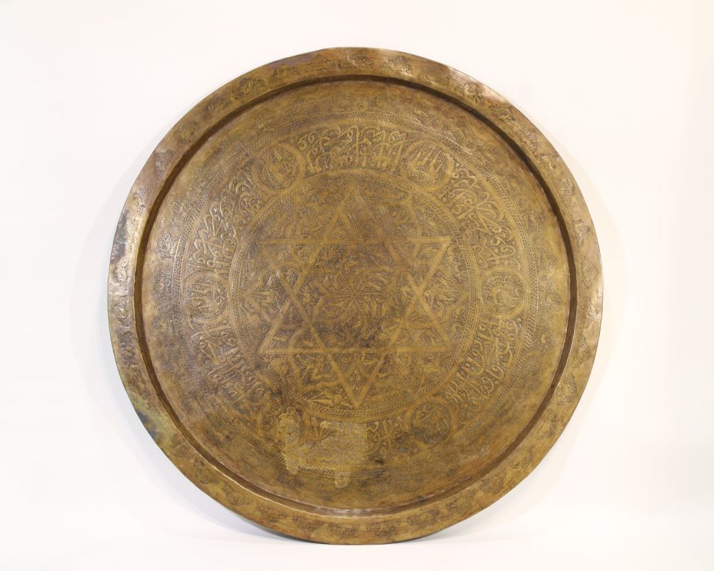 Lot 93: Late 19th-century Persian metal tray adorned with elegant...
