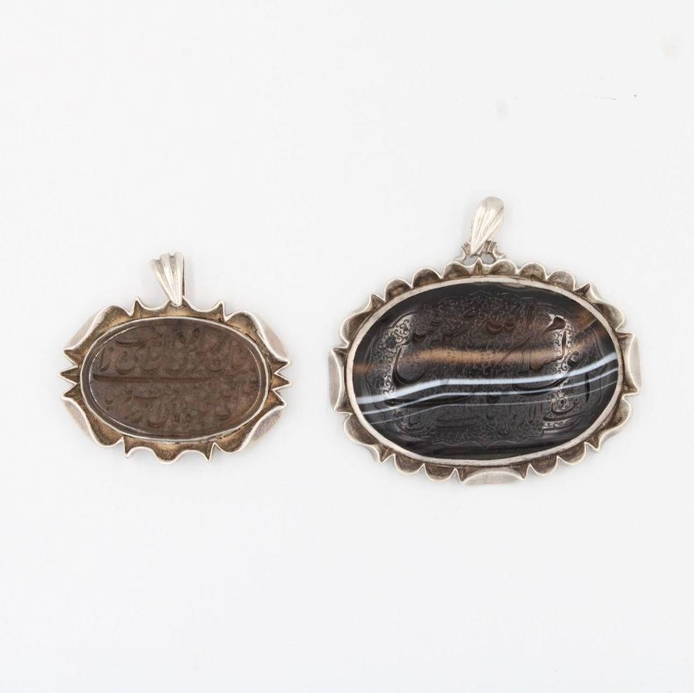Lot 112: These Islamic Persian silver pendants hold profound significance....