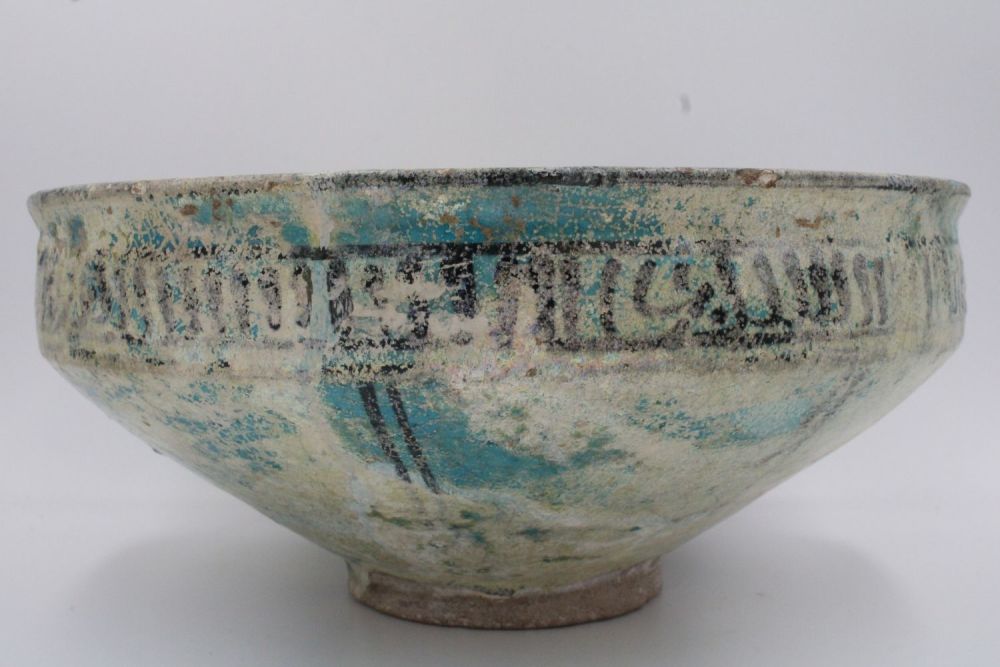 Lot 114: This rare 12th-century Islamic ceramic piece, despite some...