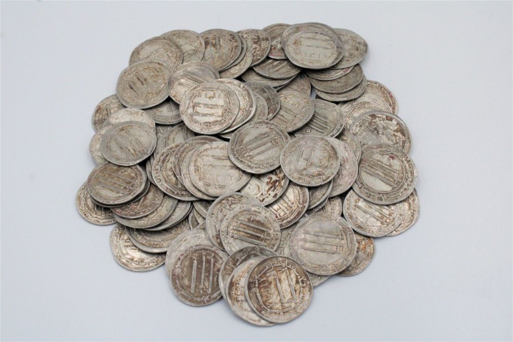 Lot 141: Large Collection of 100 Abbasid Islamic Silver Coins:...