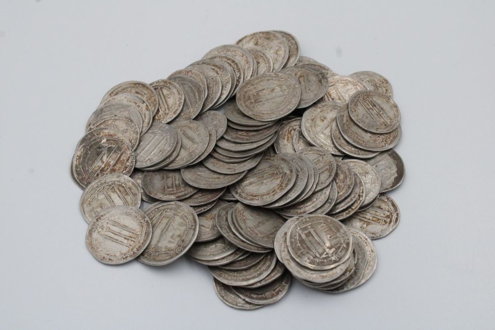 Lot 142: A collection of 100 Abbasid Islamic Silver Coins:...