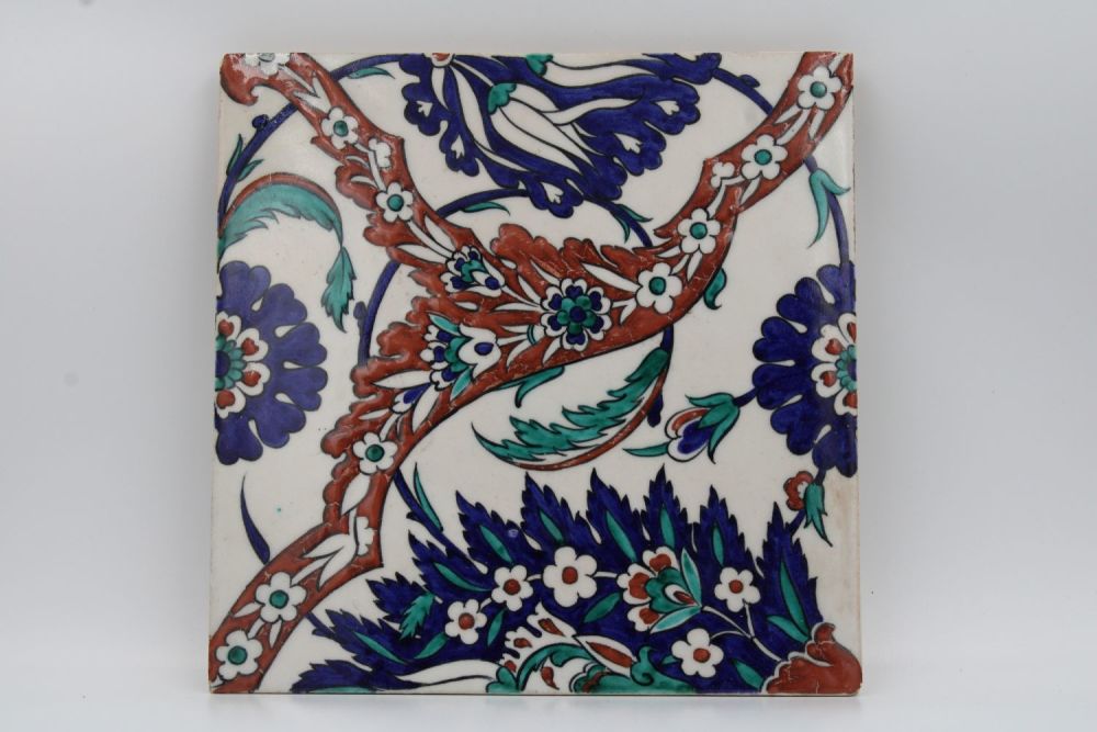 Lot 182: This vibrant Turkish tile, created in the 20th...