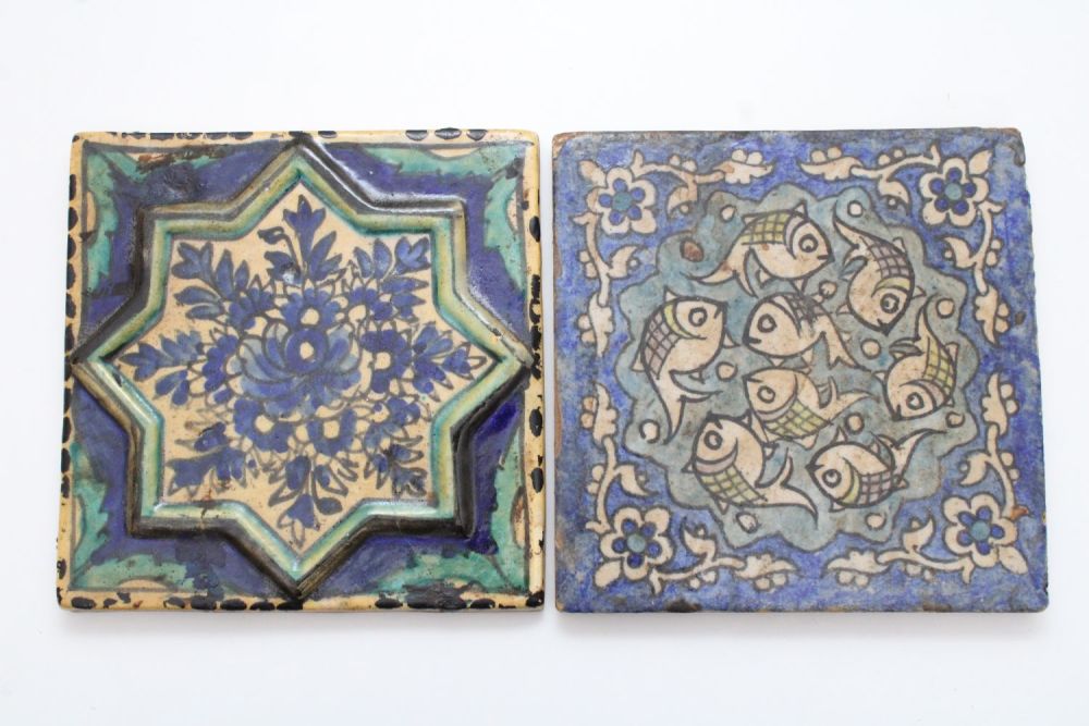 Lot 186: Qajar Style Ceramic Tiles: This pair of Qajar-style...