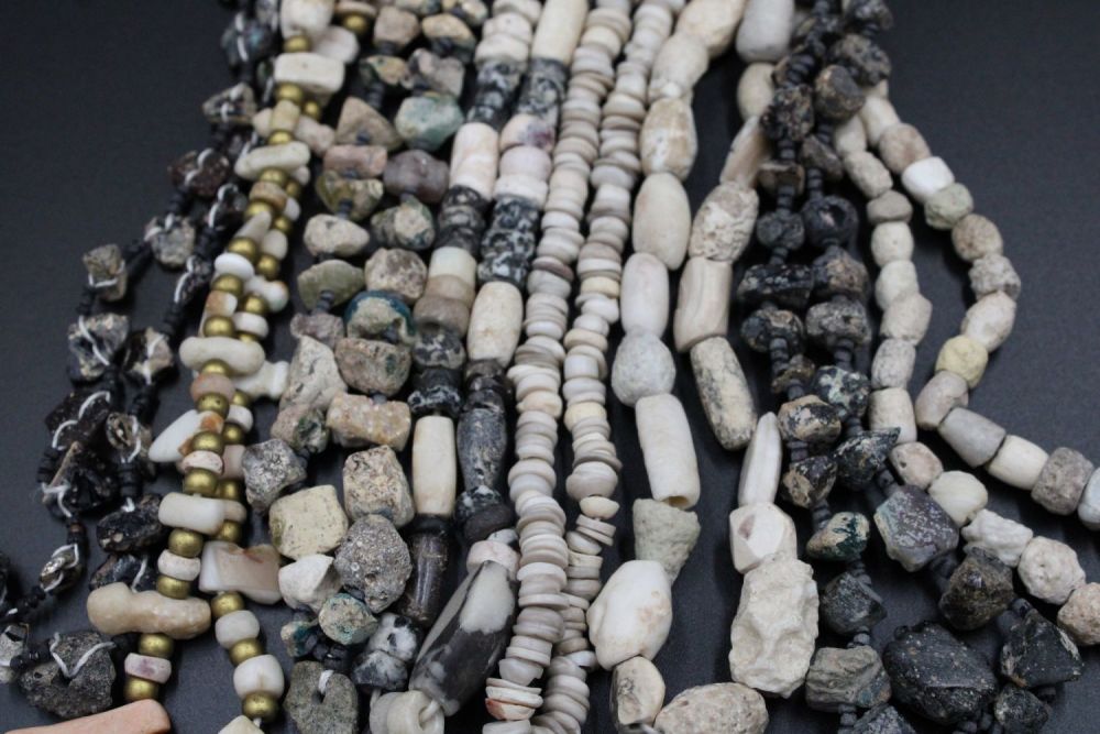 Lot 188: A set of 8 antique necklaces.
