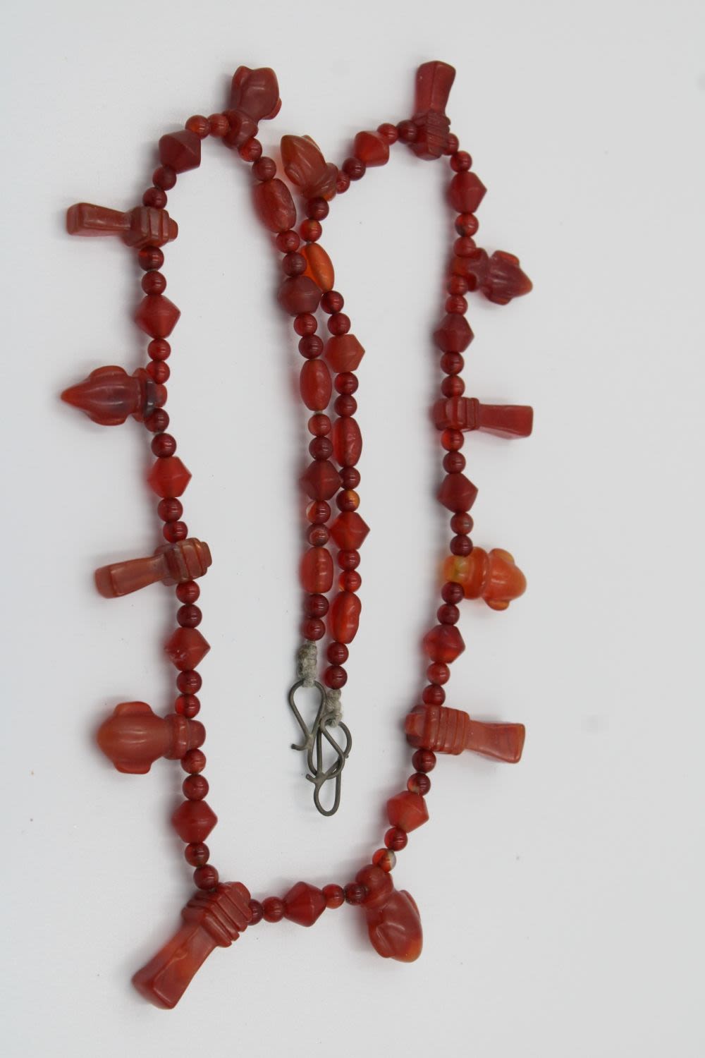 Lot 209: Egyptian agate necklace featuring a key to the...