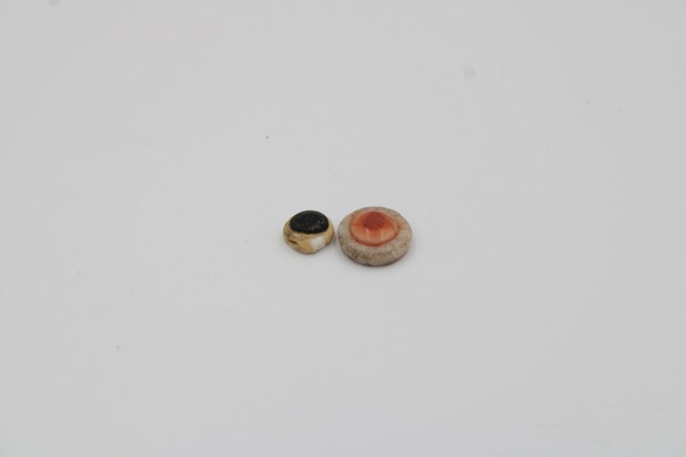 Lot 211: Pair of Egyptian Eyes: One Glass, One Agate...