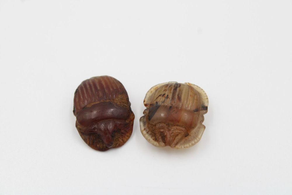 Lot 218: Pair of captivating Egyptian carnelian scarab insects, rich...