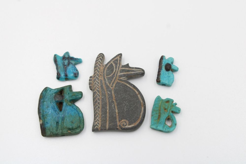 Lot 220: Set of 4 Egyptian faience eyes and 1...
