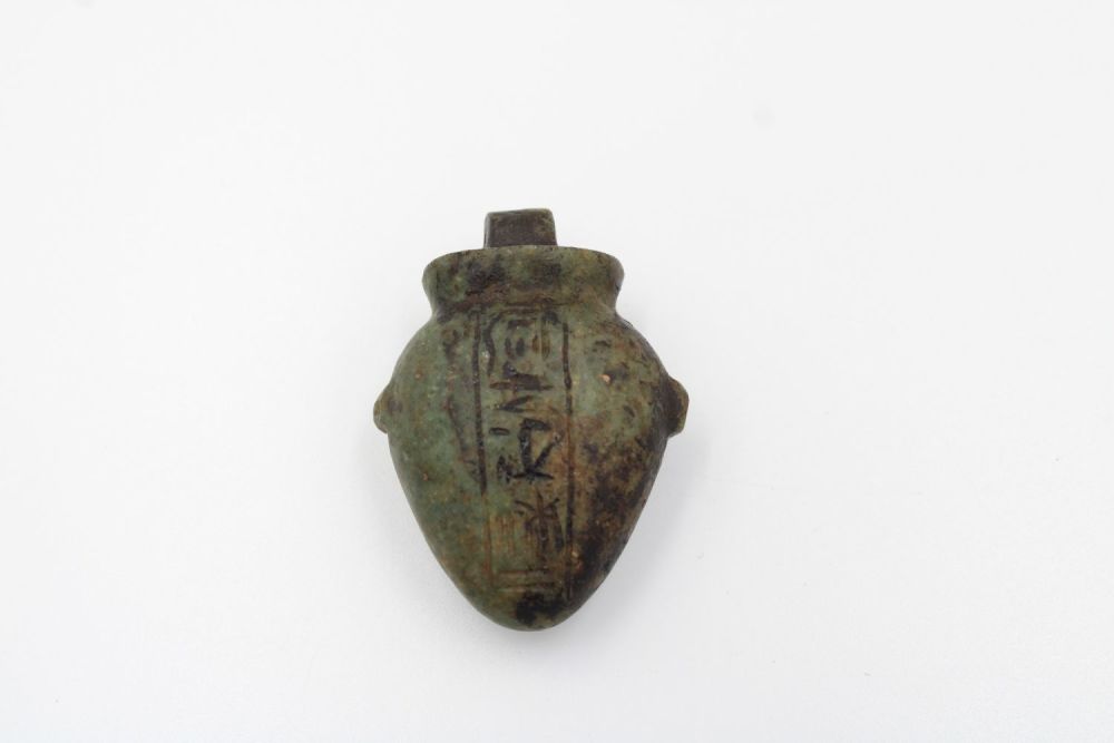 Lot 221: Exceptional Egyptian green heart-shaped stone with intricate hieroglyphic...