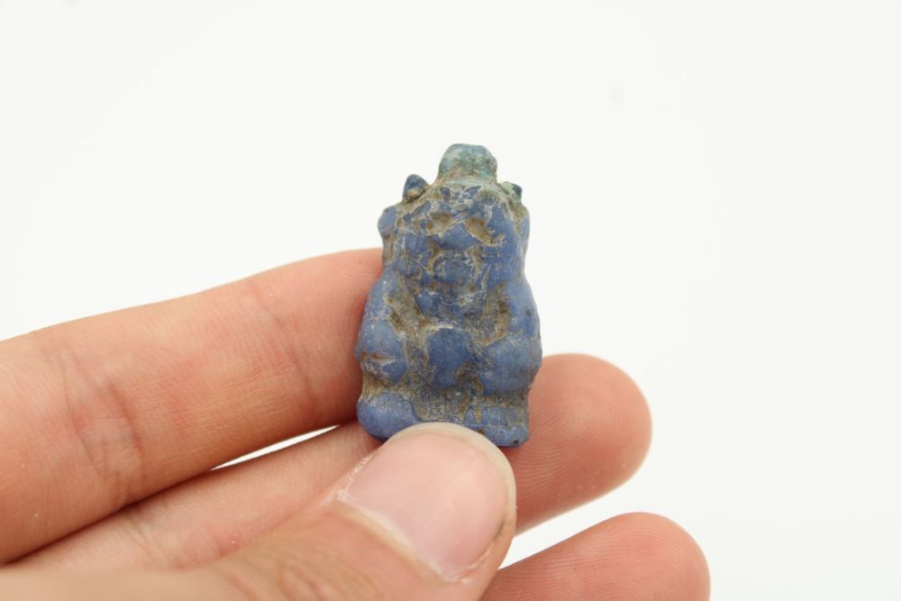 Lot 224: Ancient Egyptian glass depiction of "Bes, " a...