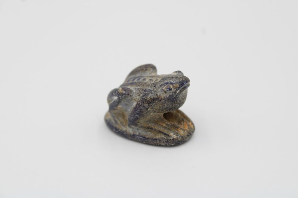 Lot 225: Ancient Egyptian frog-shaped stamp carved from black stone.